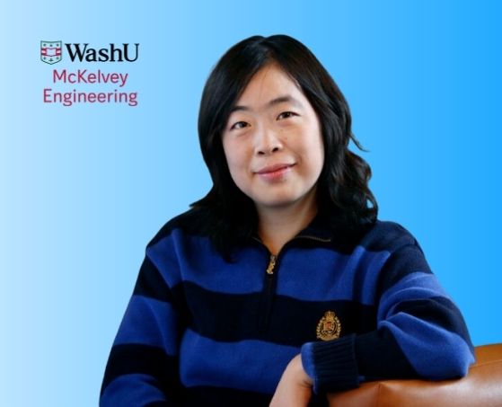 A person in a blue striped sweater sits in front of a gradient blue background. The "WashU McKelvey Engineering" logo is visible in the top left corner. The person appears calm and composed.